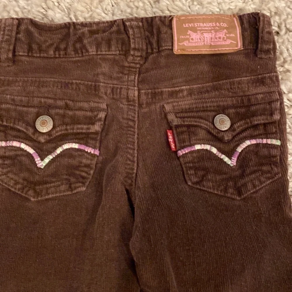 Levi’s Brown stretch corduroy with pink and purple yarn accents 2T
